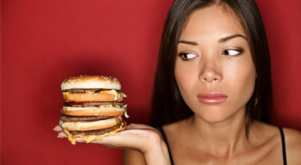 woman with hamburger