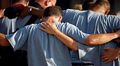 men praying