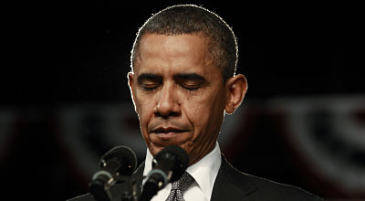 Obama praying