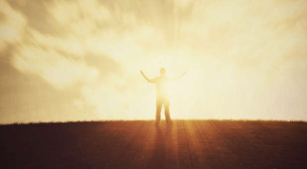 man praising God
