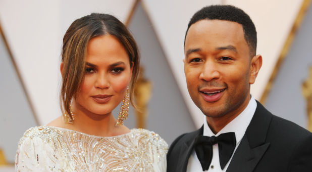 Chrissy Teigen and John Legend at the Oscars.