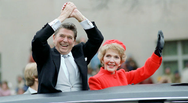 Ronald and Nancy Reagan wave from the limousine during their inaugural parade in Washington, D.C., U.S. in January 1981.