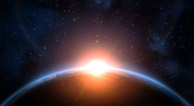 The Sun shining over the horizon.
